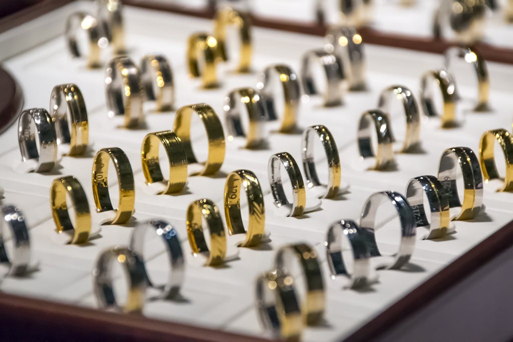 A luxurious display of gold and silver rings, perfect for showcasing jewelry collections.